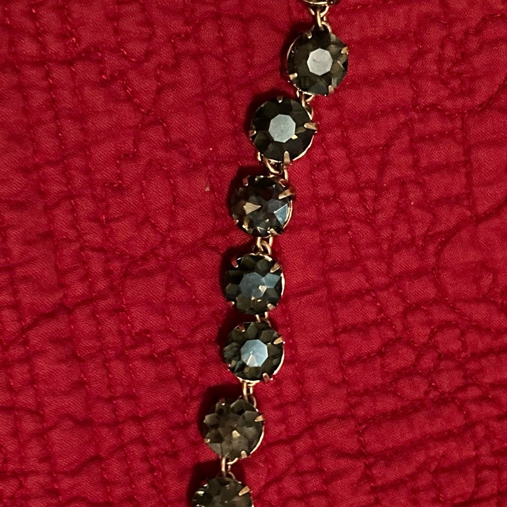 Multicolor bracelet. Chain type .  Hangs loose.